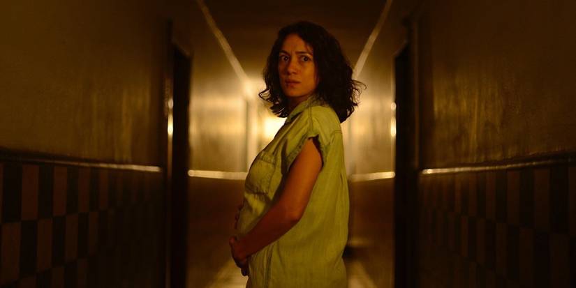  The Bone Woman, Natalia Solián holds her pregnant belly