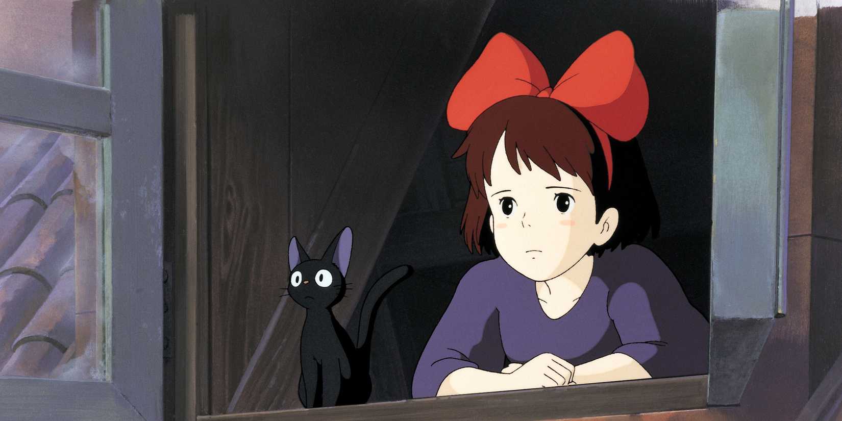 Kiki and a black cat looking through an open window in 'Kiki's Delivery Service'