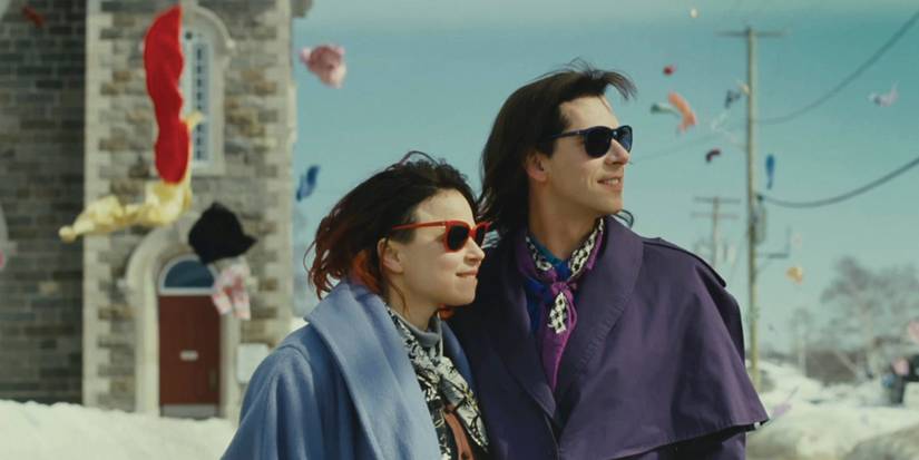 Melvil Poupaud and Suzanne Clément smiling and looking to the distance in Laurence Anyways