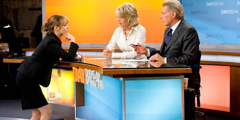 Rachel McAdams, Diane Keaton, and Harrison Ford at a news desk in Morning Glory.
