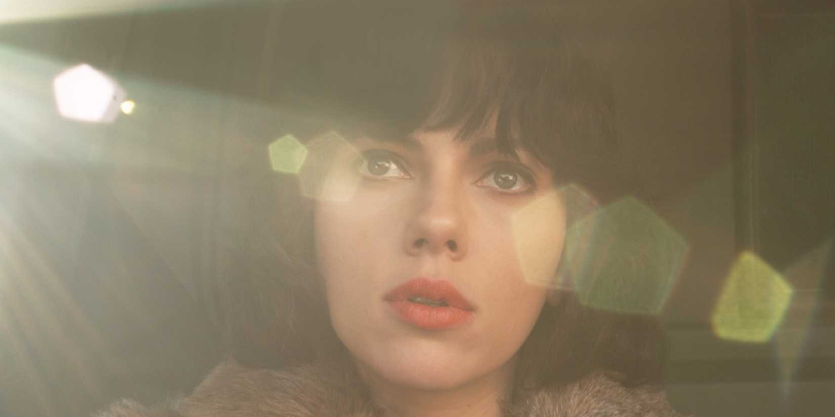 Scarlett Johansson looks into the sunlight in Under the Skin.
