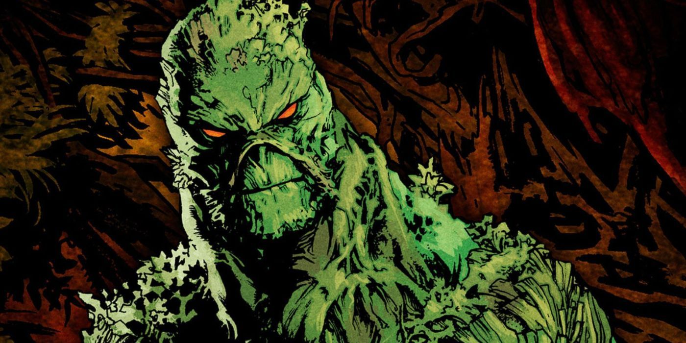 Swamp Thing in front of a dark background 