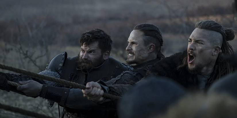 Three men preparing for battle in The Last Kingdom Sequel Seven Kings Must Die
