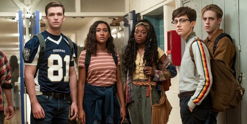 Friend group standing in corridor in There's Someone Inside Your House 