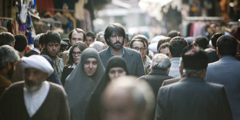 Ben Affleck walking down a crowded street in Argo