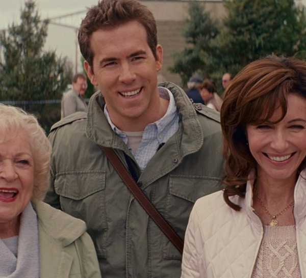 Betty White, Ryan Reynolds, and Mary Steenburgen smiling in The Proposal
