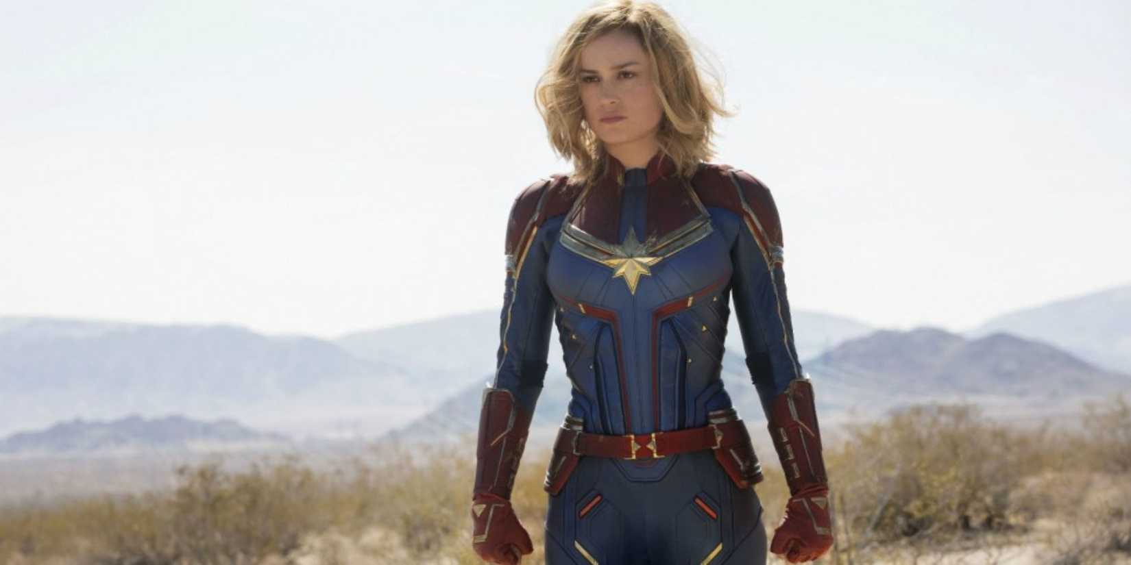 Brie Larson as Captain Marvel looking onward into the distance. 