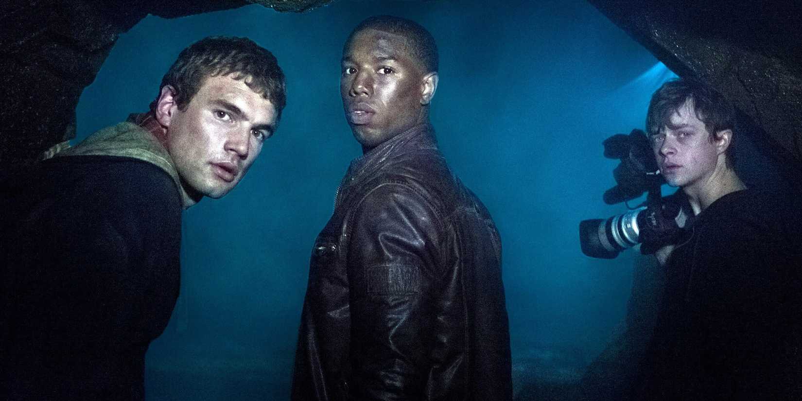 Three teenagers in a cave looking back in Chronicle