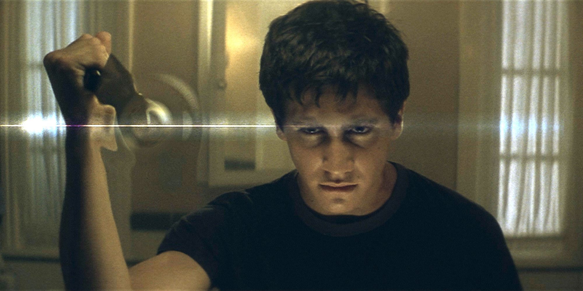 Donnie Darko looking directly in the mirror in Donnie Darko’ (2001)