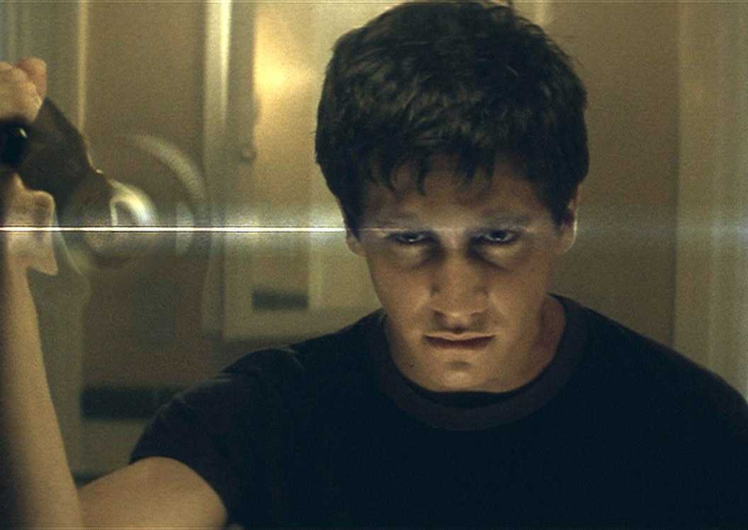 Donnie Darko looking directly in the mirror in Donnie Darko’ (2001)