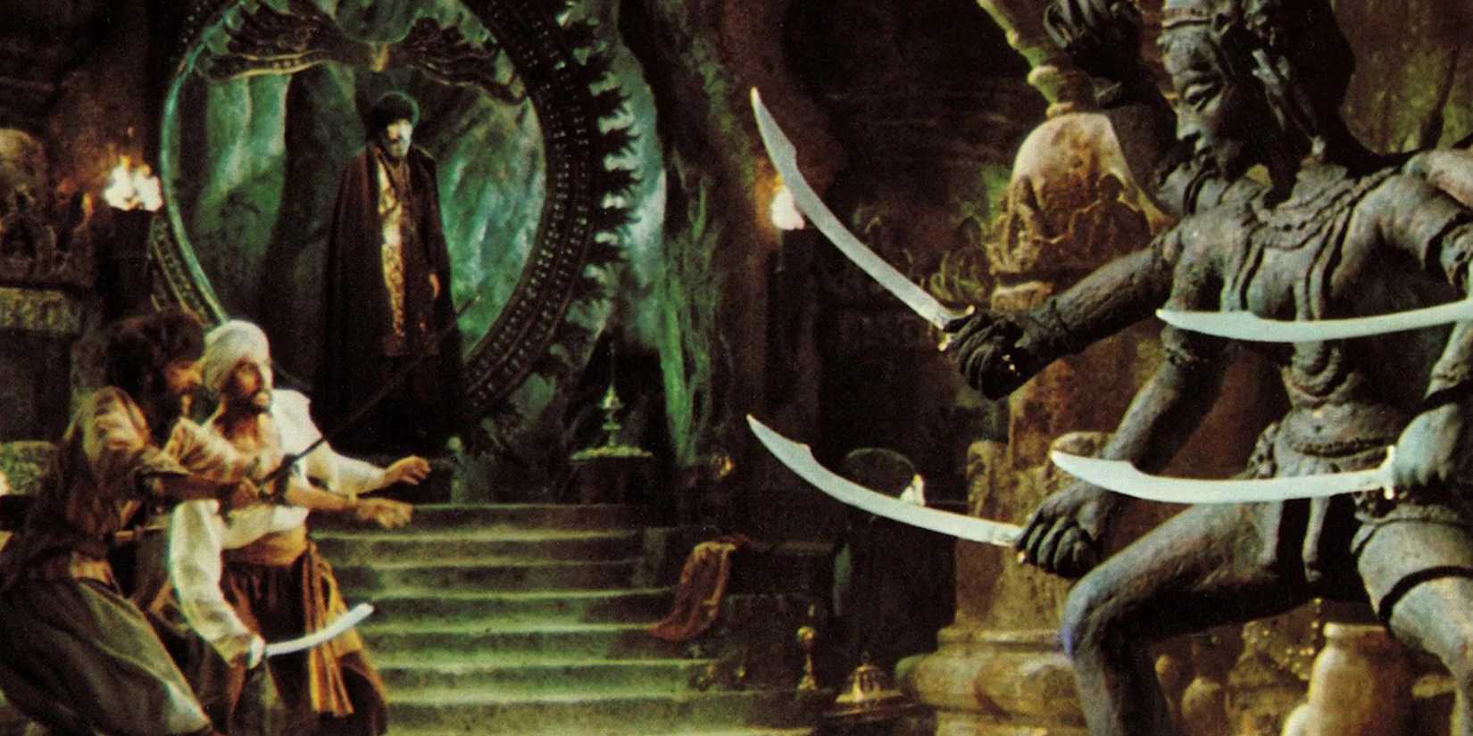 Two men with swords fight a giant statue that is wielding swords in The Golden Voyage of Sinbad.