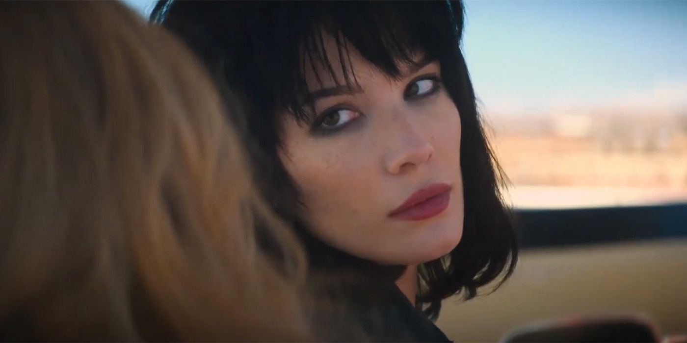 Halsey stares back at someone in Americana