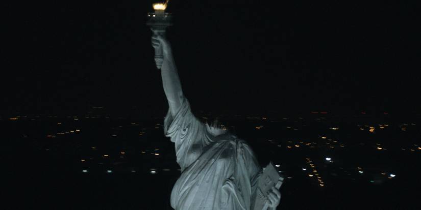 Headless Statue of Liberty against the night sky in Cloverfield.