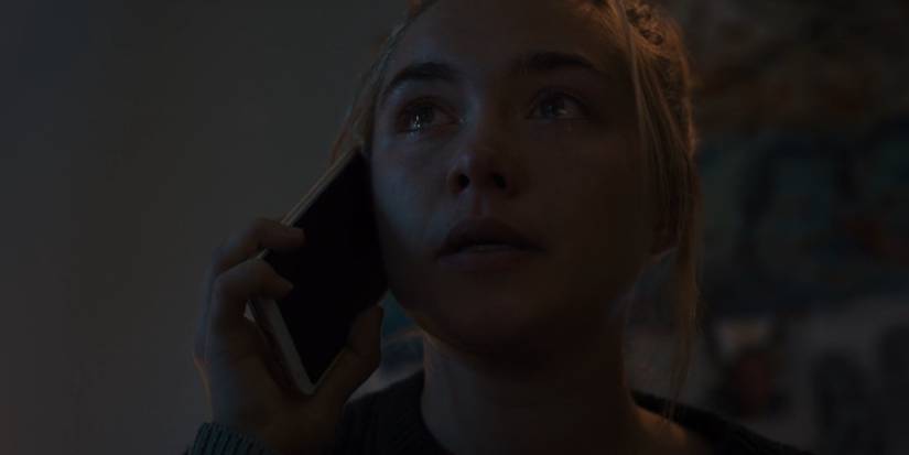Florence Pugh on the phone in Midsommar
