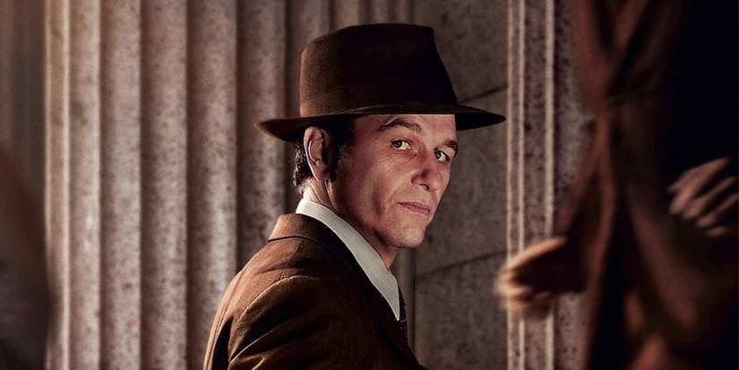 Matthew Rhys as Perry Mason in a hat looking to the side in the poster for Season 2.