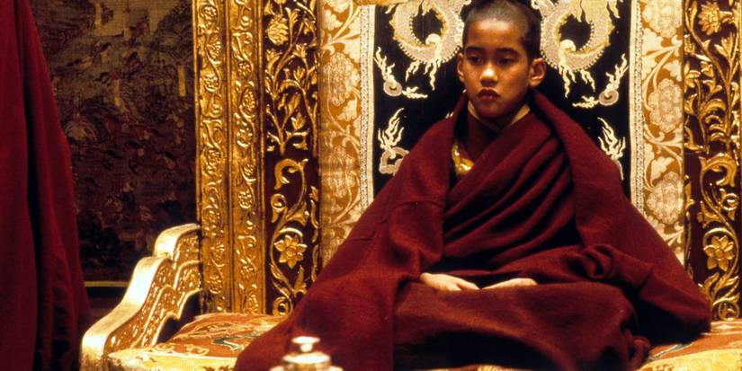 The young Dalai Lama sitting on the throne in 'Kundun'