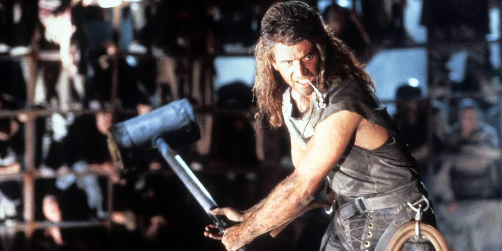 Max wielding a hammer in Mad Max Beyond Thunderdome (1985)