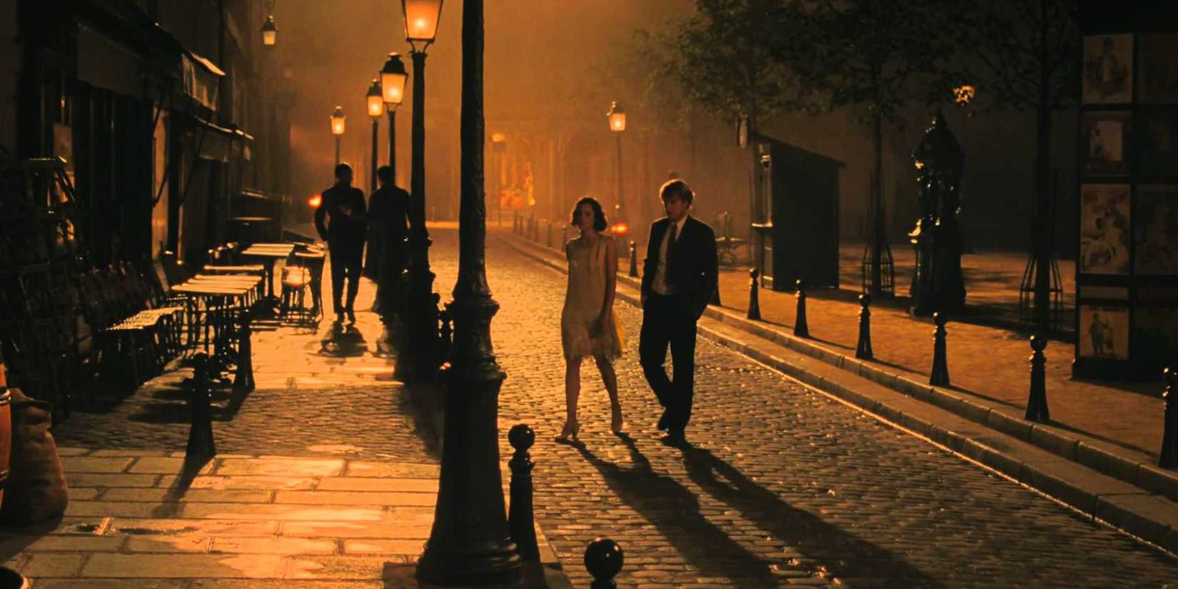 Marion Cotillard and Owen Wilson walking in Paris at night in Midnight in Paris