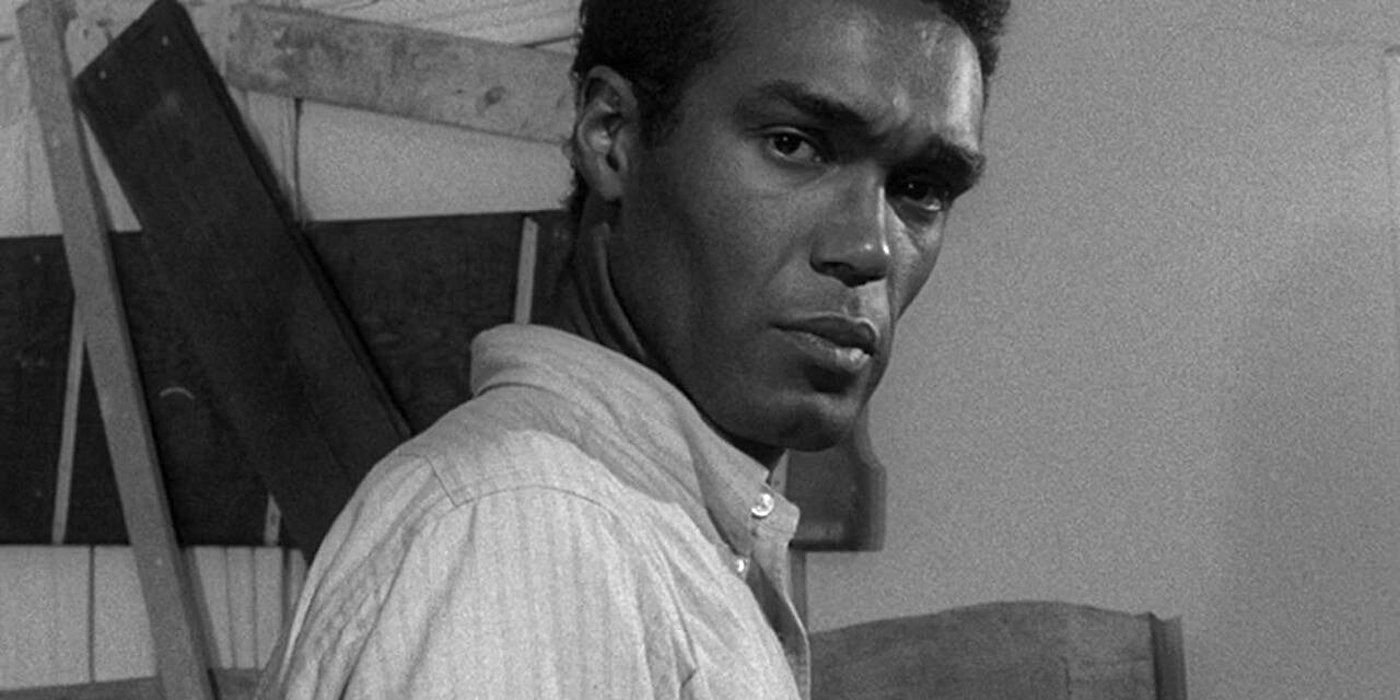 Ben looking intently in Night of the Living Dead