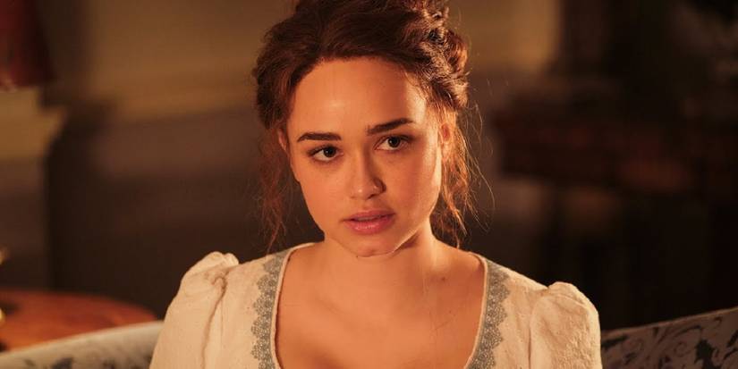 Rose Williams in a period dress looking up in a scene from 'Sanditon' Season 3.