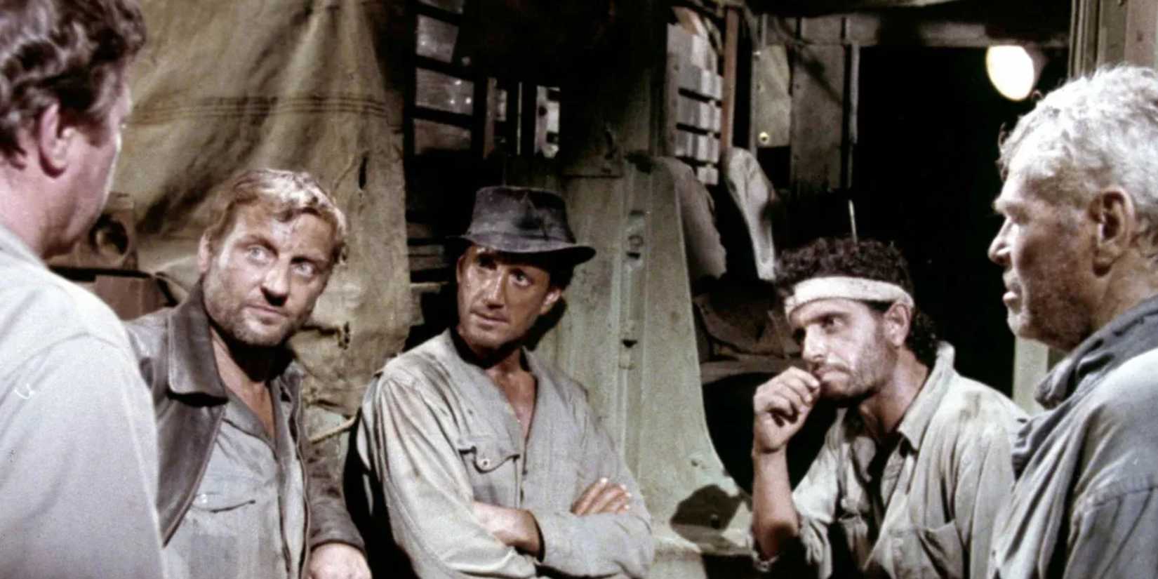 Roy Scheider, Amidou, Ramon Bieri, Bruno Cremer, and Karl John talking in 1977's Sorcerer