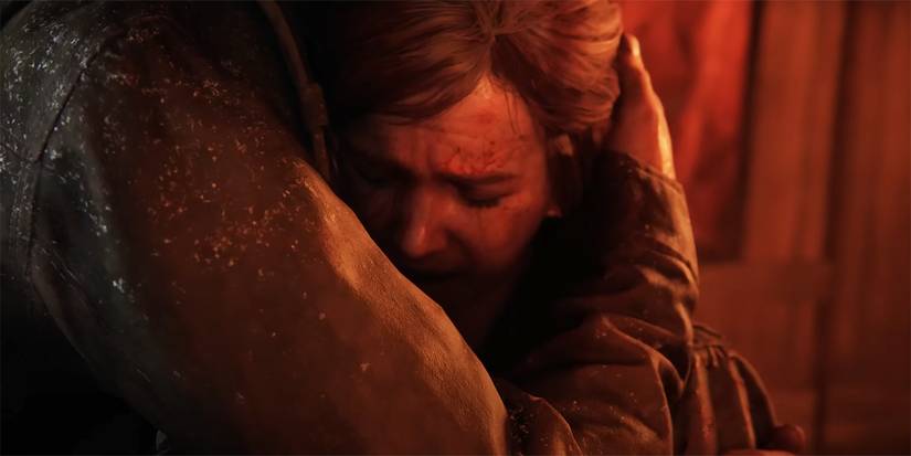 Ellie crying into Joel's arms in The Last of Us Part I
