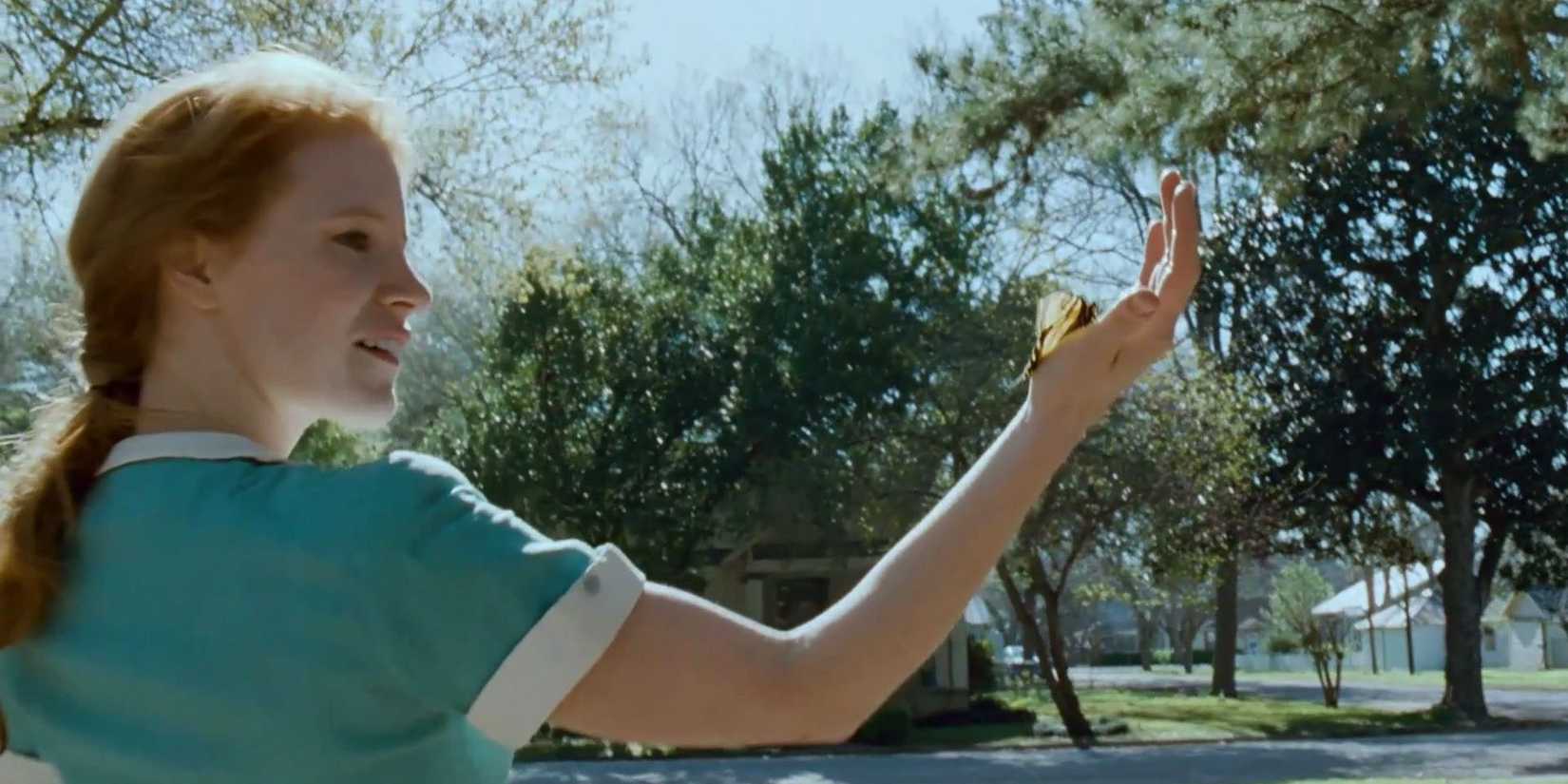 Jessica Chastain as Mrs. O'Brien marvels at butterfly in "Tree of Life."