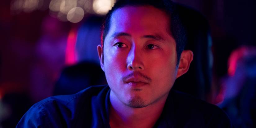 Steven Yeun as Danny looking at a person offscreen in Beef Episode 2