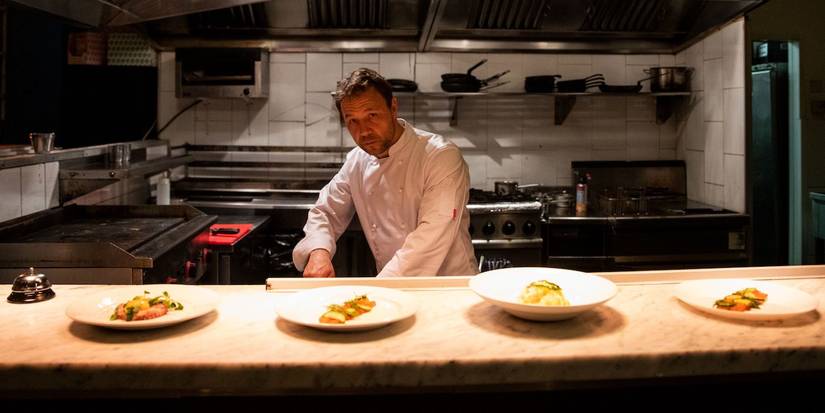 Stephen Graham as Andy working in a kitchen in Boiling Point