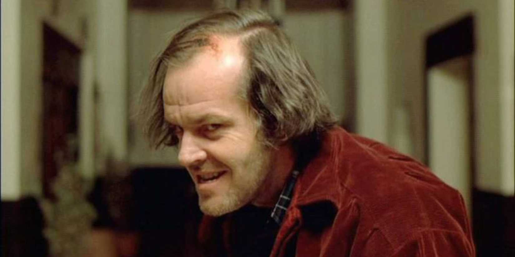 Jack Nicholson as Jack Torrance rises in a sinister manner in The Shining (1980)