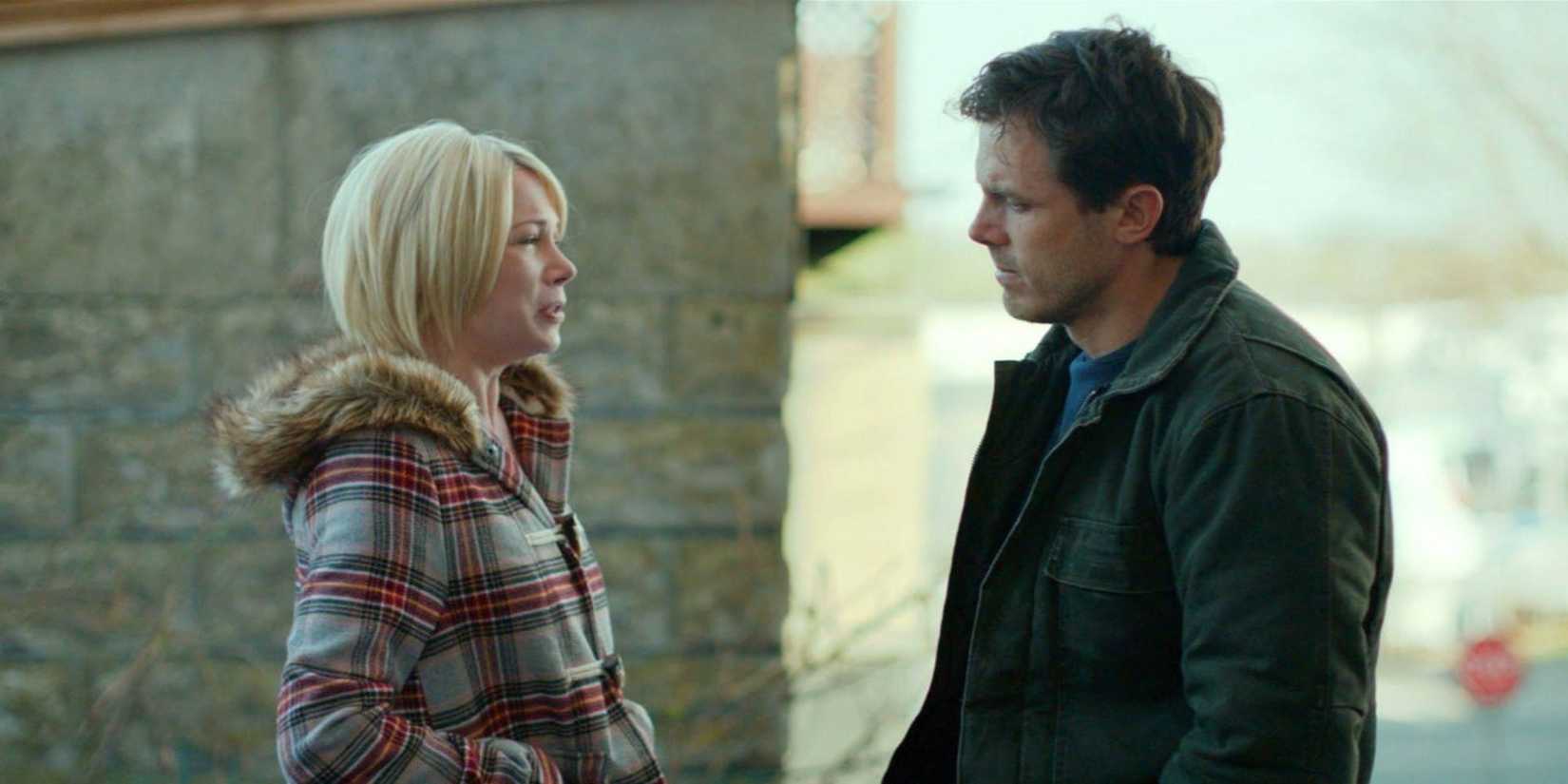 Michelle Williams as Randi and Casey Affleck as Lee talking on the street in Manchester By the Sea