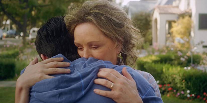 Mother and Son hugging in Munchausen