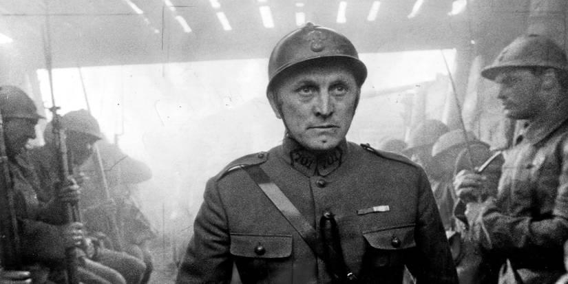Kirk Douglas as Colonel Dax walking down the trench in Paths of Glory