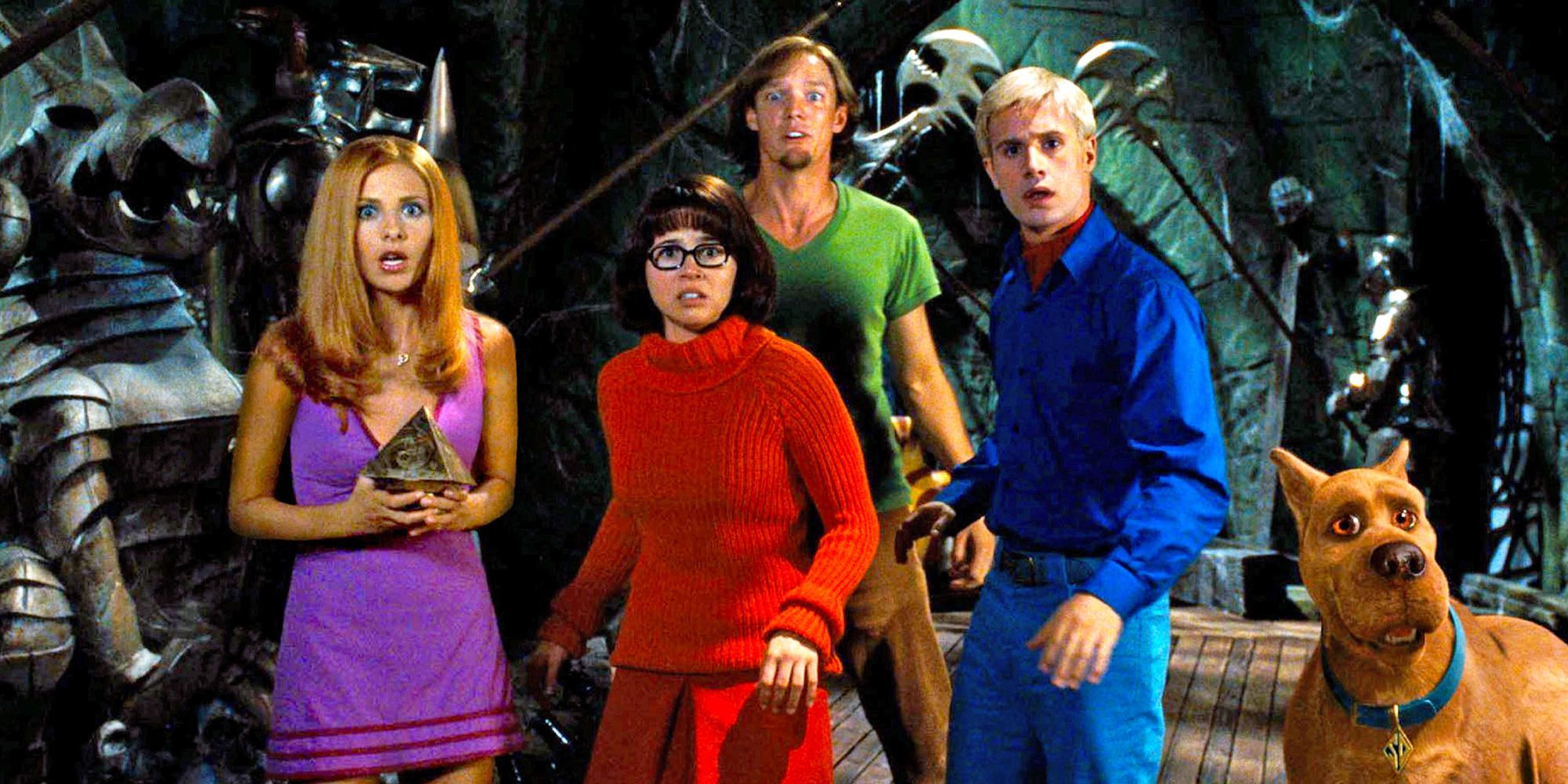 The Mystery Inc. gang, including Daphne (Sarah Michelle Gellar), Velma (Linda Cardellini), Shaggy (Matthew Lillard), Fred (Freddie Prinze Jr.), and Scooby-Doo (