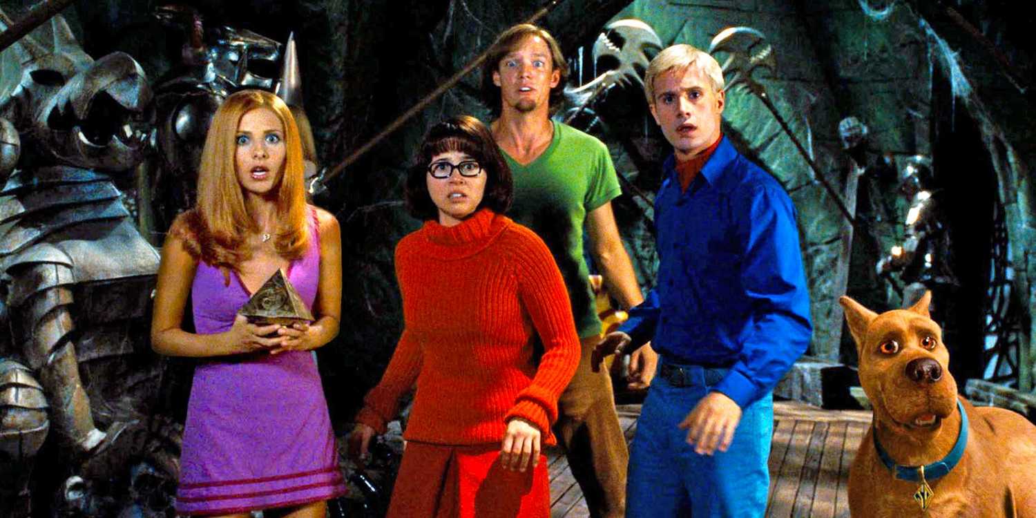 The Mystery Inc. gang, including Daphne (Sarah Michelle Gellar), Velma (Linda Cardellini), Shaggy (Matthew Lillard), Fred (Freddie Prinze Jr.), and Scooby-Doo (