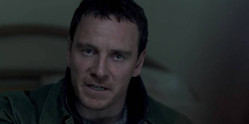 Michael Fassbender looking pained in The Snowman