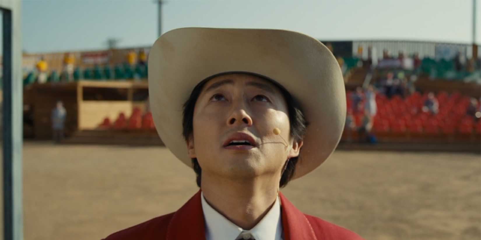 Steven Yeun looking up in Nope