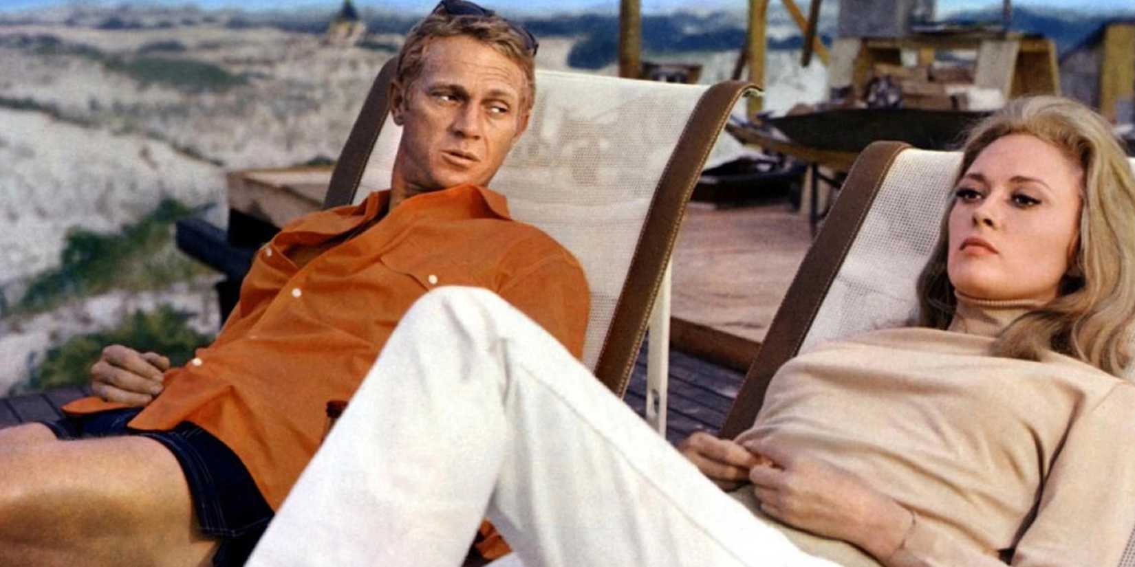 Steve McQueen as Thomas relaxing on a beach next to Faye Dunaway as Vicki in The Thomas Crown Affair (1968)