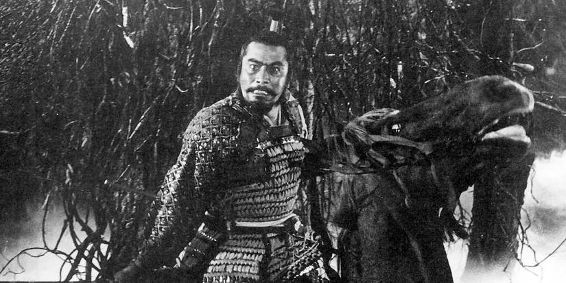 An angry samurai in a dark forest in Throne of Blood