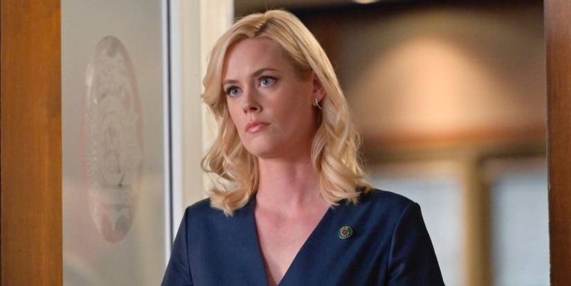 Baker (Abigail Hawk) standing in the Commissioner's office on 'Blue Bloods.'