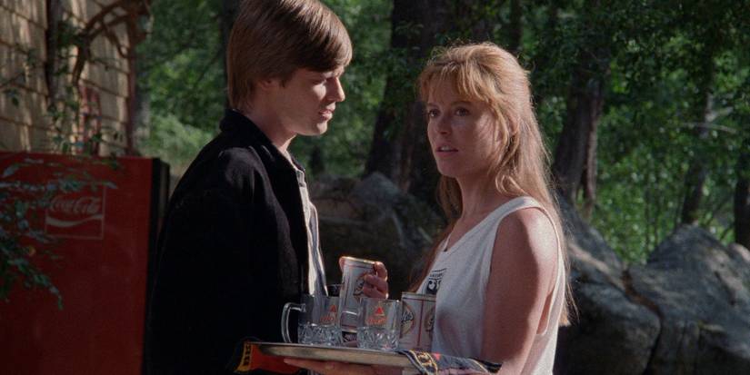 Barton Faulks and Christina Marie Lane in Edge of the Axe (1988)