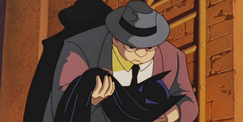 Sid the Squid holding Batman's cowl.