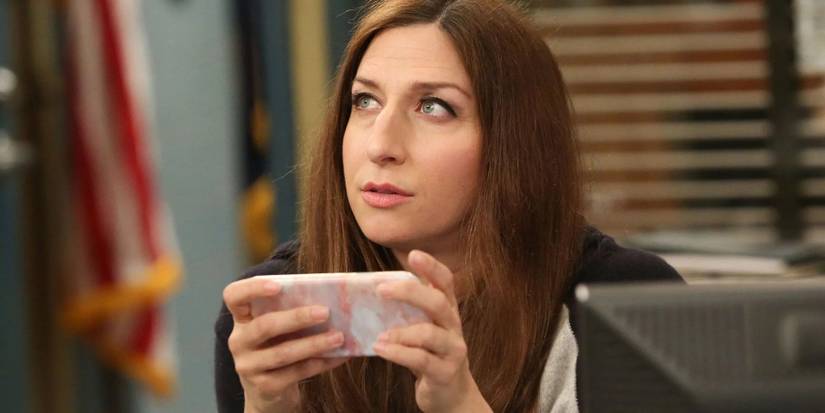 Chelsea Peretti as Gina Linetti in 'Brooklyn Nine-Nine', on her phone