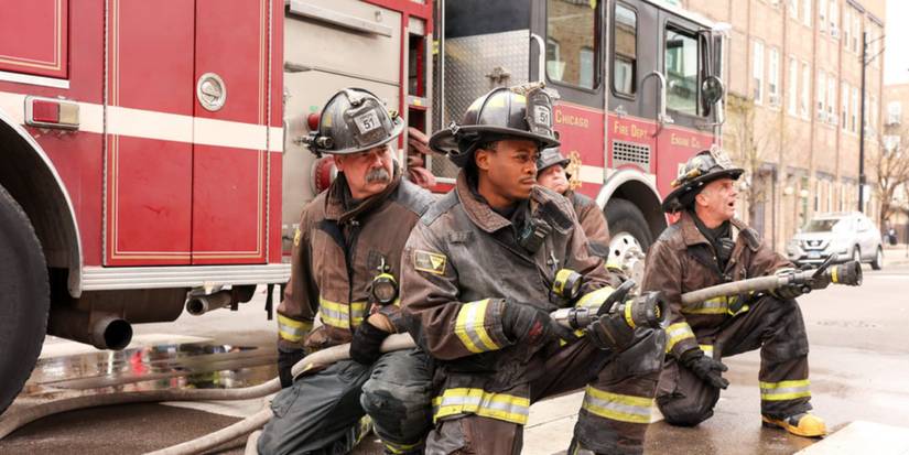 Darren Ritter and Christopher Herrmann aim their firehoses in Season 9 of Chicago Fire