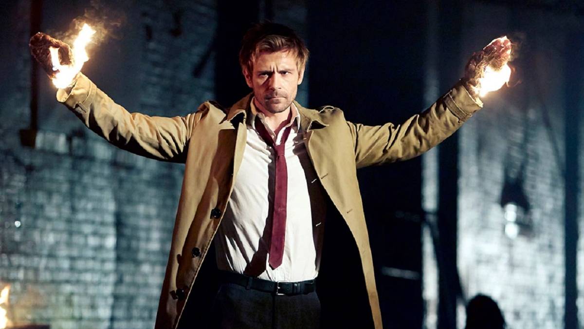 Matt Ryan as John Constantine with his hands on fire as he casts a spell on the NBC series Constantine