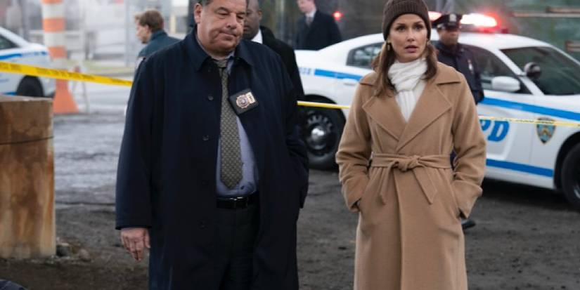 Steve Schirripa and Bridget Moynahan in Blue Bloods. 