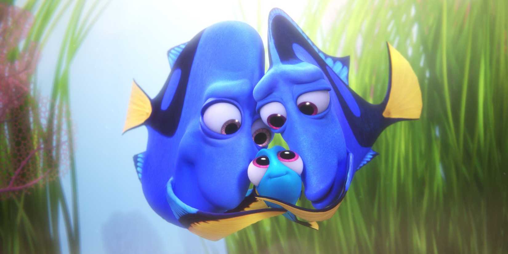 Young Dory and her parents cuddling in Finding Dory. 