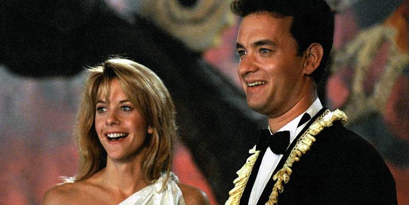 Meg Ryan as Dede and Tom Hanks as Joe smiling and looking ahead in Joe Versus the Volcano.