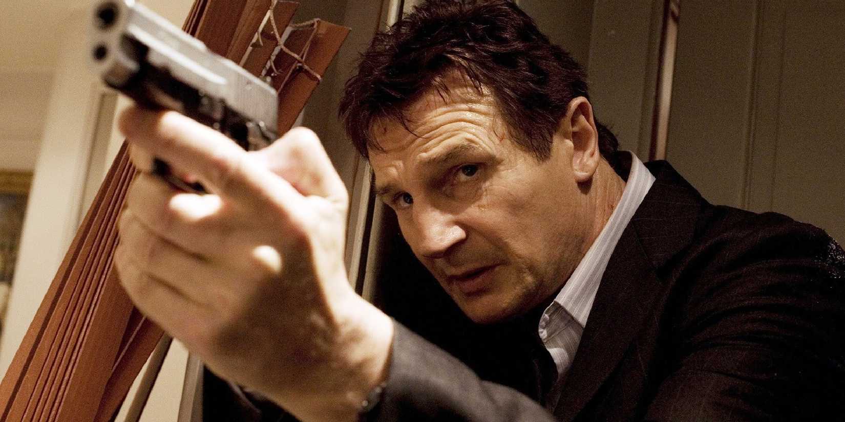 Liam Neeson aiming a gun in Taken