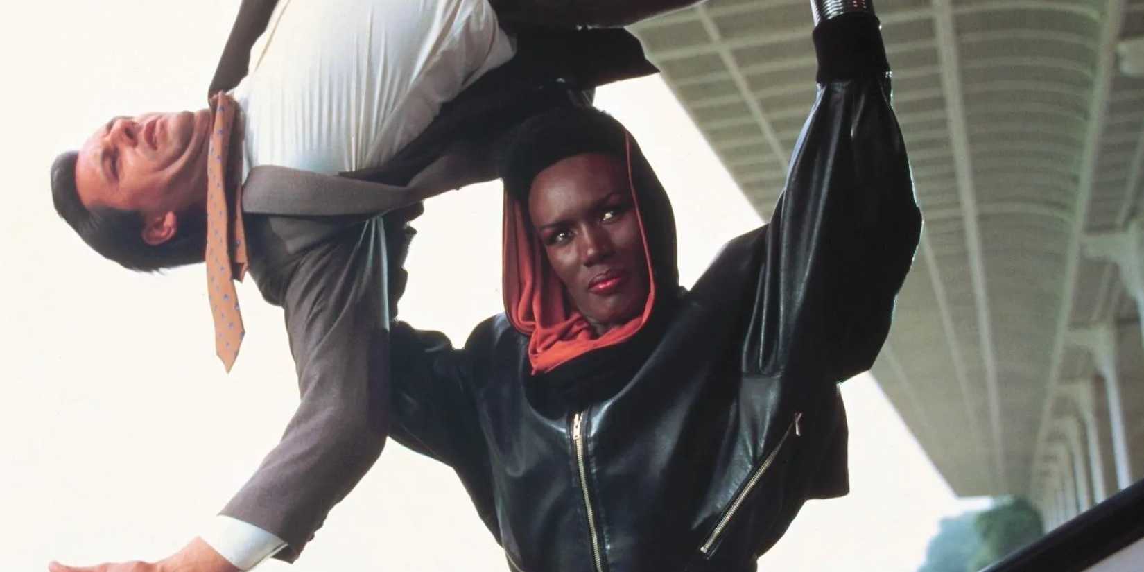 May Day (Grace Jones) holds a Secret Service agent aloft above her head in 'A View to a Kill',